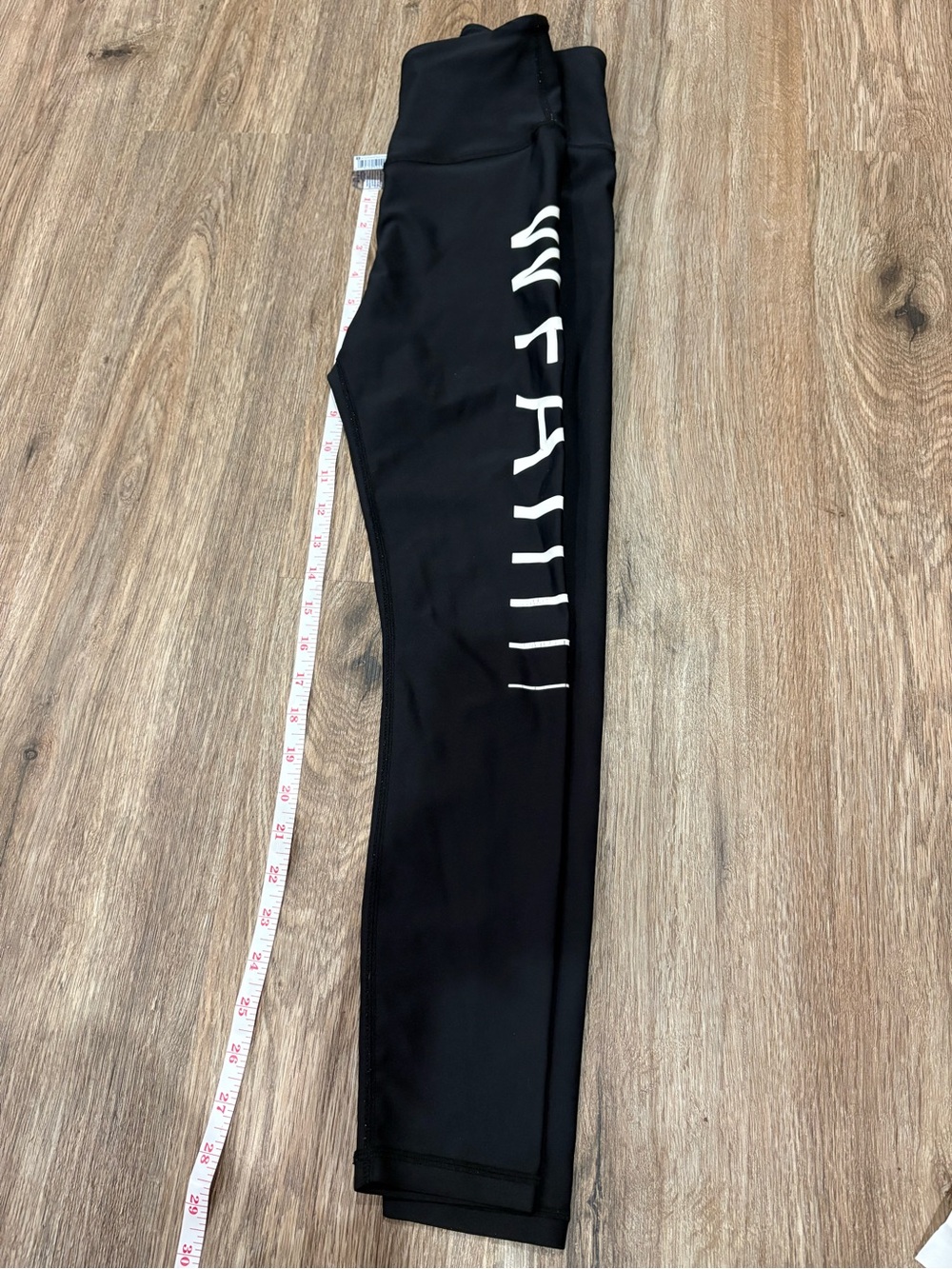 White Fox Boutique Black Leggings with White Side Script